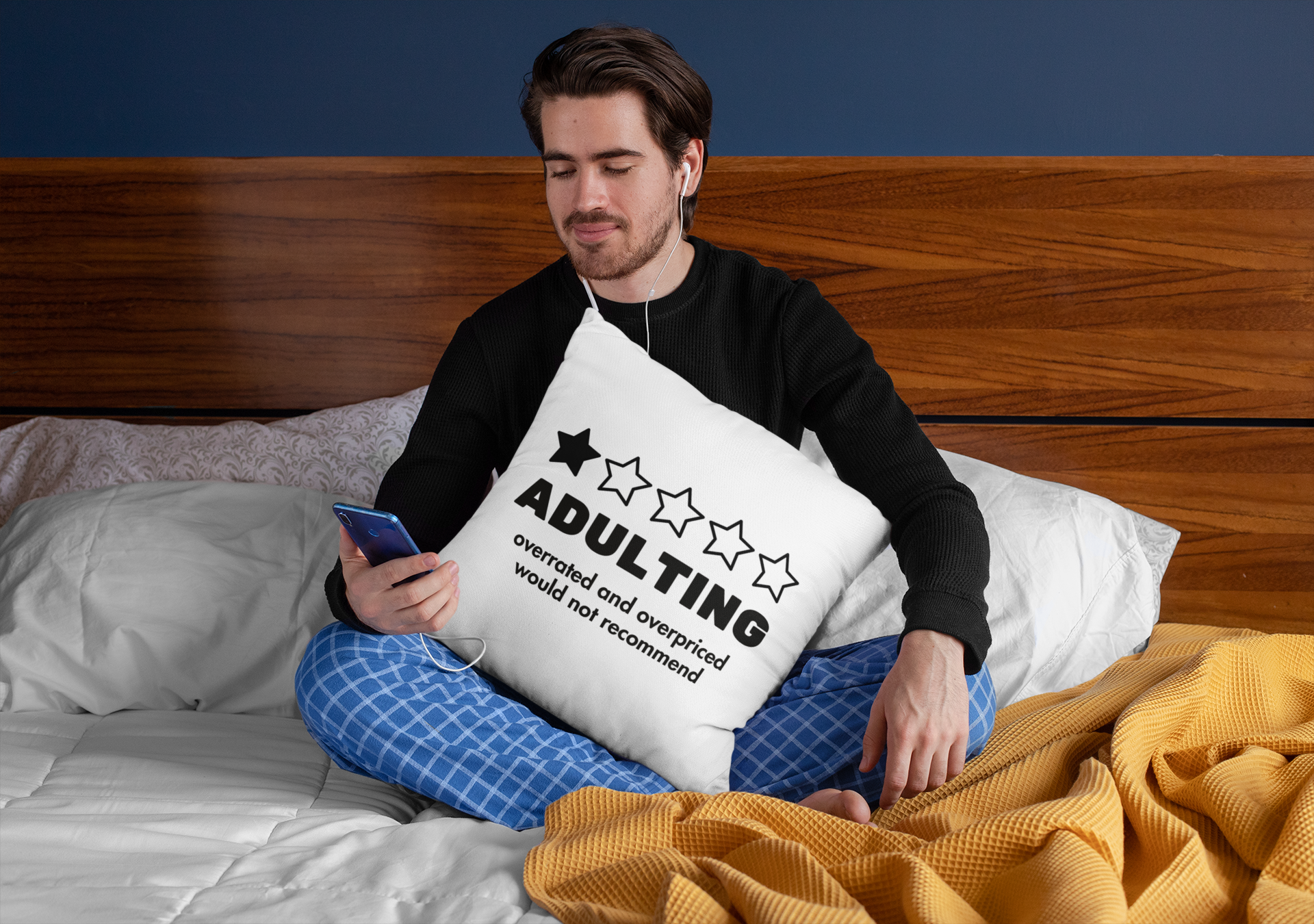 adulting is overpriced pillow with man in bed